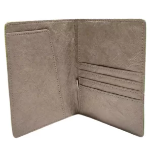 Porta-cartões aberto em Tyvek com várias ranhuras para cartões e um acabamento texturado